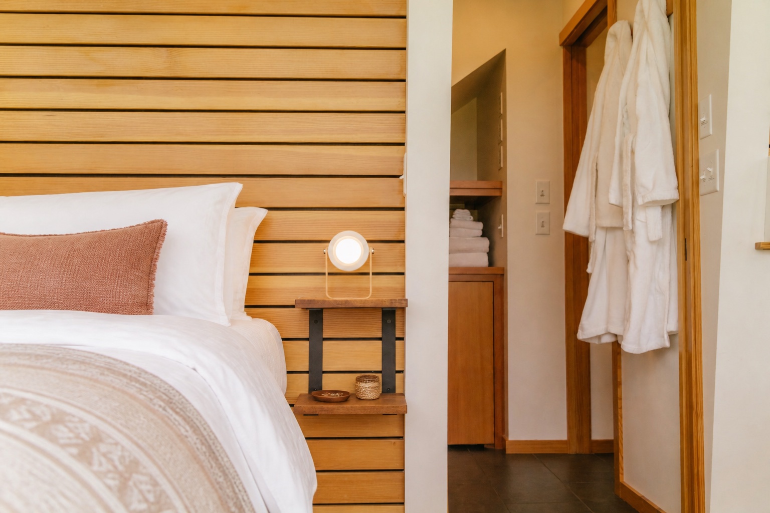 Warm accommodation bedroom styled for a stronger listing